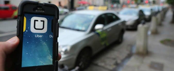 File photo dated 31/05/14 of the Uber mobile phone app in use, as the company will open its first major customer services hub outside the US as part of a multi-million euro expansion into Ireland. PRESS ASSOCIATION Photo. Issue date: Tuesday July 28, 2015. The investment will create 150 jobs by the end of this year in Limerick city, the company said. See PA story IRISH Uber. Photo credit should read: Niall Carson/PA Wire