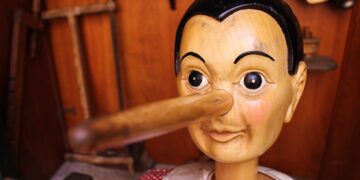 selective focus photography of Pinocchio puppet