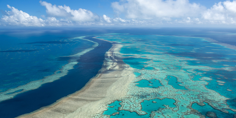 FILE - This photo provided by the Great Barrier Reef Marine Park Authority shows the Hardy Reef near the Whitsunday Islands, Australia on June 22, 2014. The Great Barrier Reef is the largest living structure on the planet _ so large, in fact, that it is the only living thing on earth visible from space. (Jumbo Aerial Photography/Great Barrier Reef Marine Park Authority via AP)
